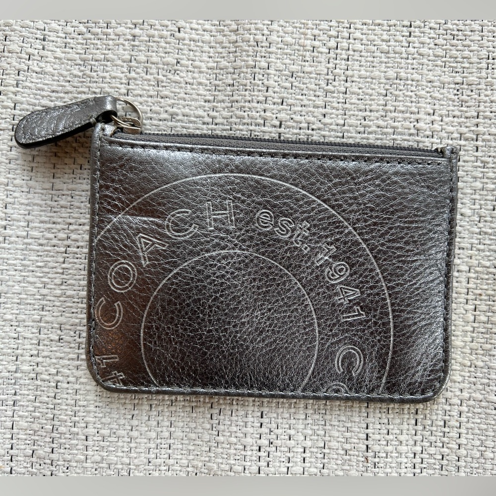 Coach metallic silver wallet. New, never used.